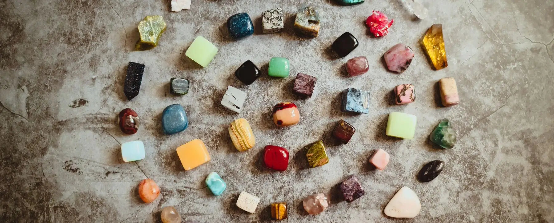 Collection of tumbled gemstones perfect for fall, including carnelian, citrine, and smoky quartz.