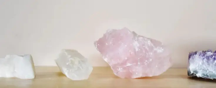Woman holding various crystals, online crystal shopping guide