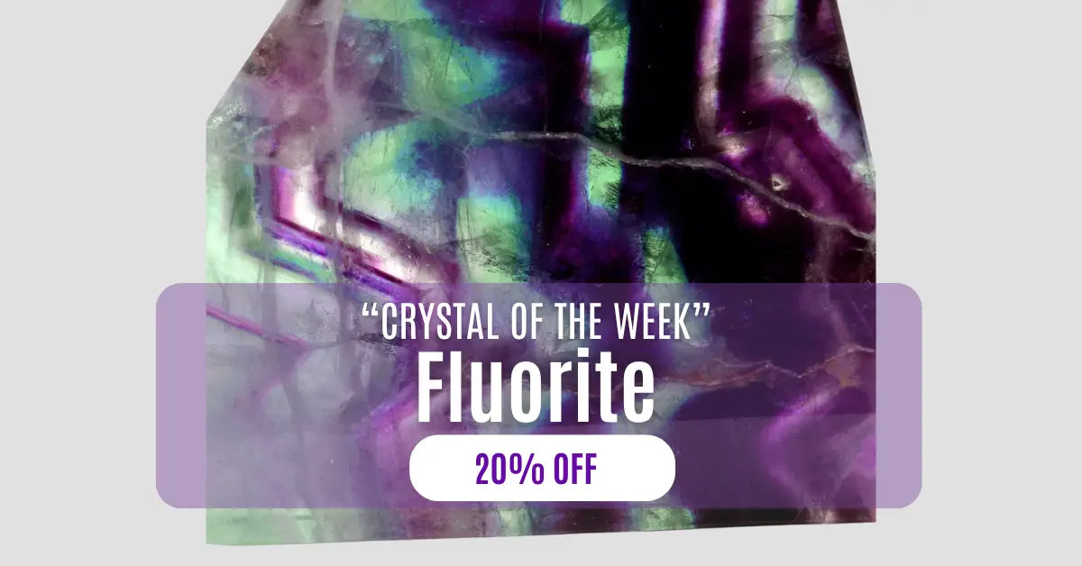 Fluorite crystal cluster, purple and green hues, showcasing various crystal formations,  faceted and raw.