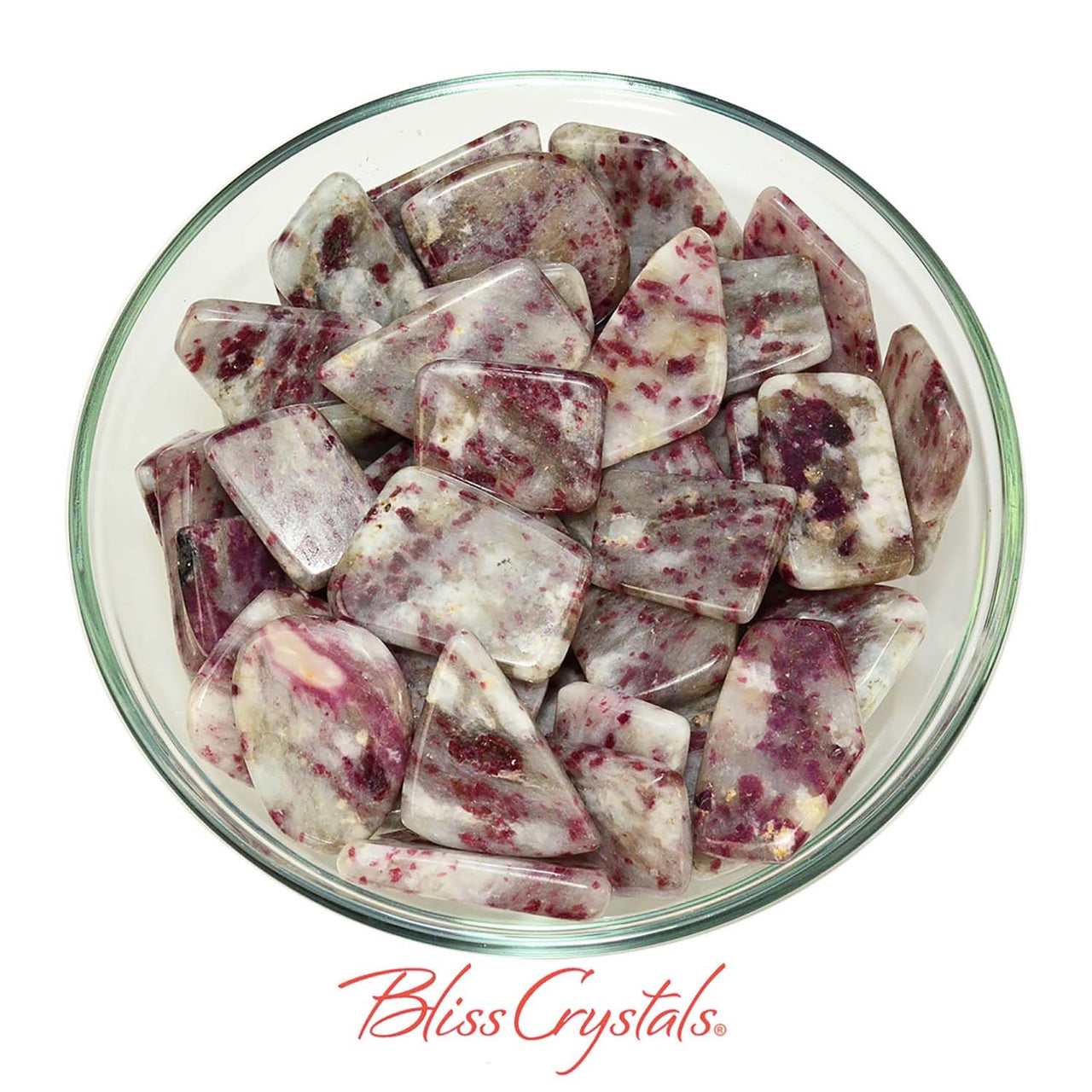 Bowl of pink tourmaline and white quartz slice crystal chunks for rubellite healing