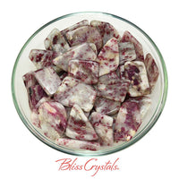 Bowl of pink tourmaline and white quartz slice crystal chunks for rubellite healing