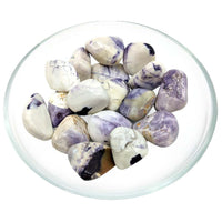 Bowl of purple and white marble Tiffany Stone Tumbled Stones for display and collection