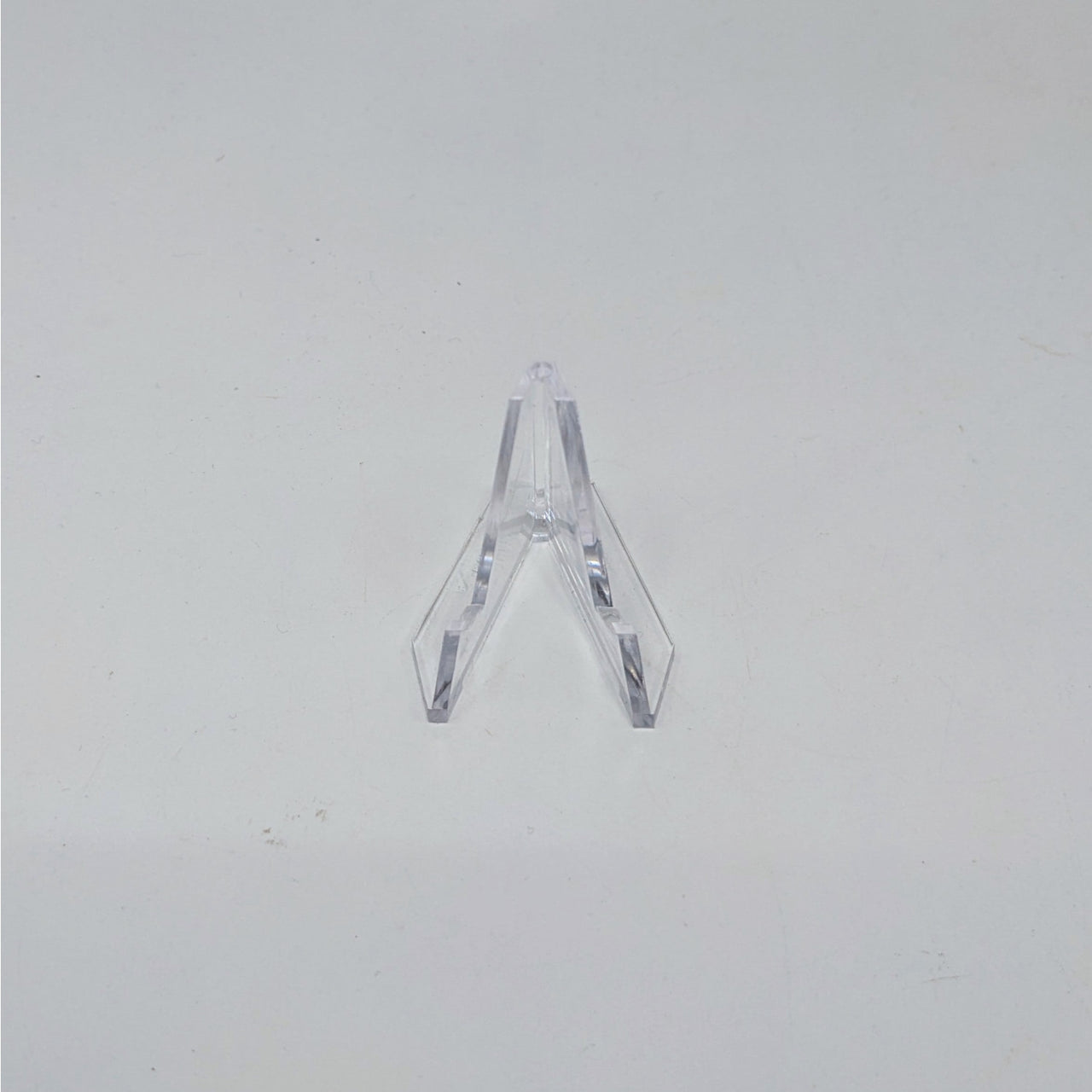 Clear plastic wishbone-shaped ring holder in Acrylic & Metal Stands Q152 easel stand