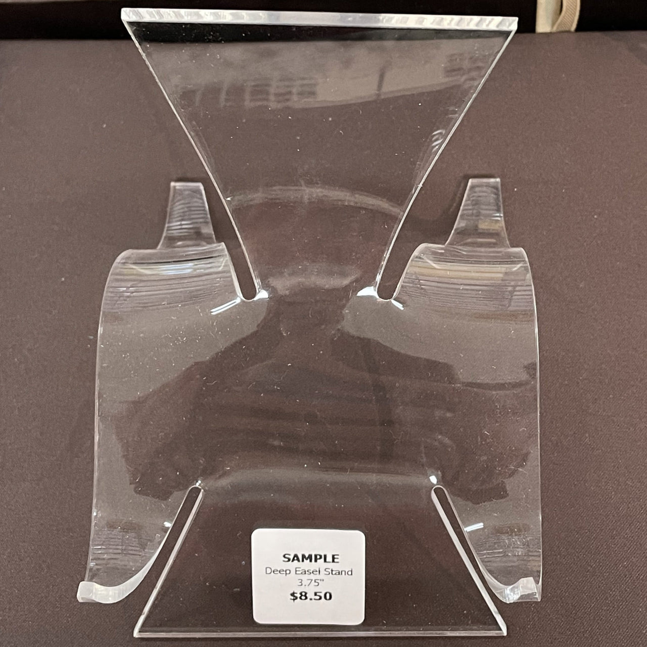 Clear acrylic display stand with price tag, ideal for Acrylic & Metal Stands #Q152
