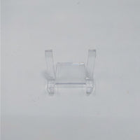 Clear plastic display stand with two supports for showcasing ring holder or art