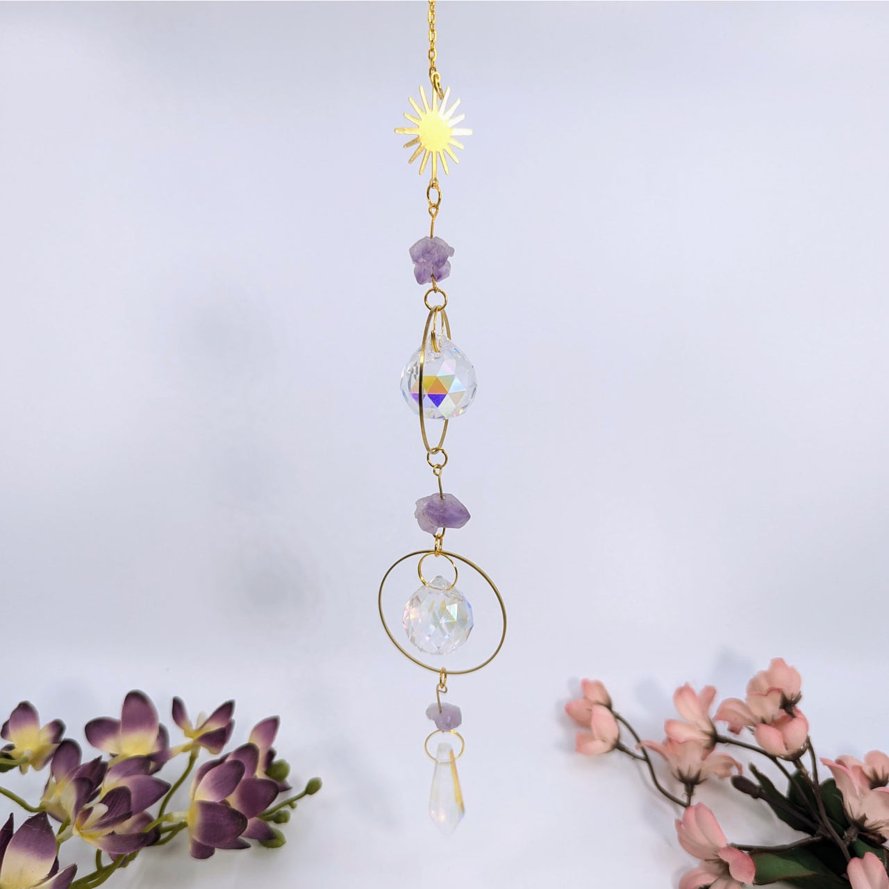 Hanging crystal suncatcher with amethyst accents for the Amethyst Double Ring 17 inch Mini Suncatcher