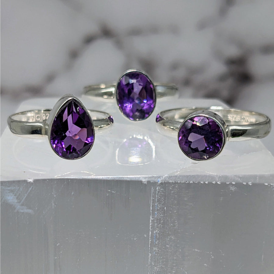 Elegant Amethyst S.S. Faceted Ring #LV3880 on white marble display