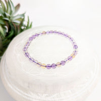 Ametrine 7 inch 5mm beaded bracelet featuring amethyst beads for stylish jewelry