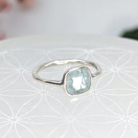 Silver ring with a square light blue Aqua Kyanite gemstone, faceted dainty design