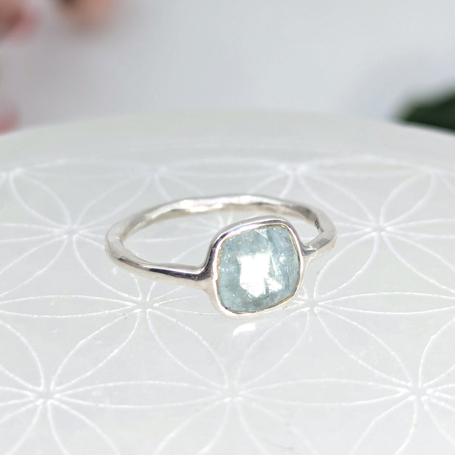Silver ring with a square light blue Aqua Kyanite gemstone, faceted dainty design