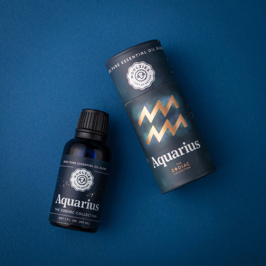 Aquarius Zodiac Essential Oil Blend 1oz in Sleek Black Bottle