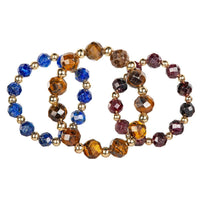 Three faceted gemstone stretch bracelets in blue, amber, red with gold beads