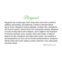 Bergamot essential oil bottle with bergia leaves and lime on Bergamot Essential Oil Info Card