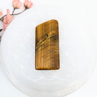 Polished Blue Tiger’s Eye 2.2-inch slab showcasing vibrant chatoyancy and smooth finish
