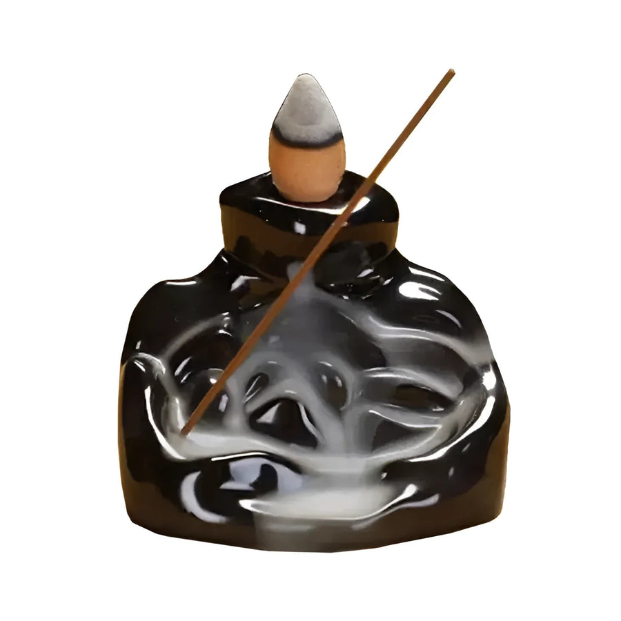 Black ceramic backflow incense burner Q335 with swirling design and white smoke