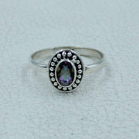 Oval faceted citrine or peridot sterling silver ring with iridescent gem and beaded border