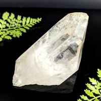 Clear quartz 5.1 inch natural point featuring a translucent faceted and pointed clear quartz crystal