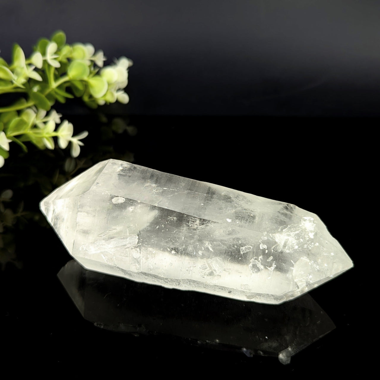 Clear quartz dt 5.25 inch natural point translucent crystal with faceted elongated shape and internal inclusions