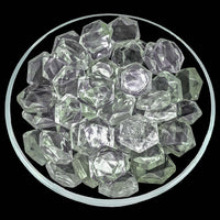 Clear and pale green ice cubes in a bowl showcasing Clear Quartz Gem Cut design