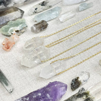 Clear quartz double terminated point pendant on 18-inch gold chain #LV9389