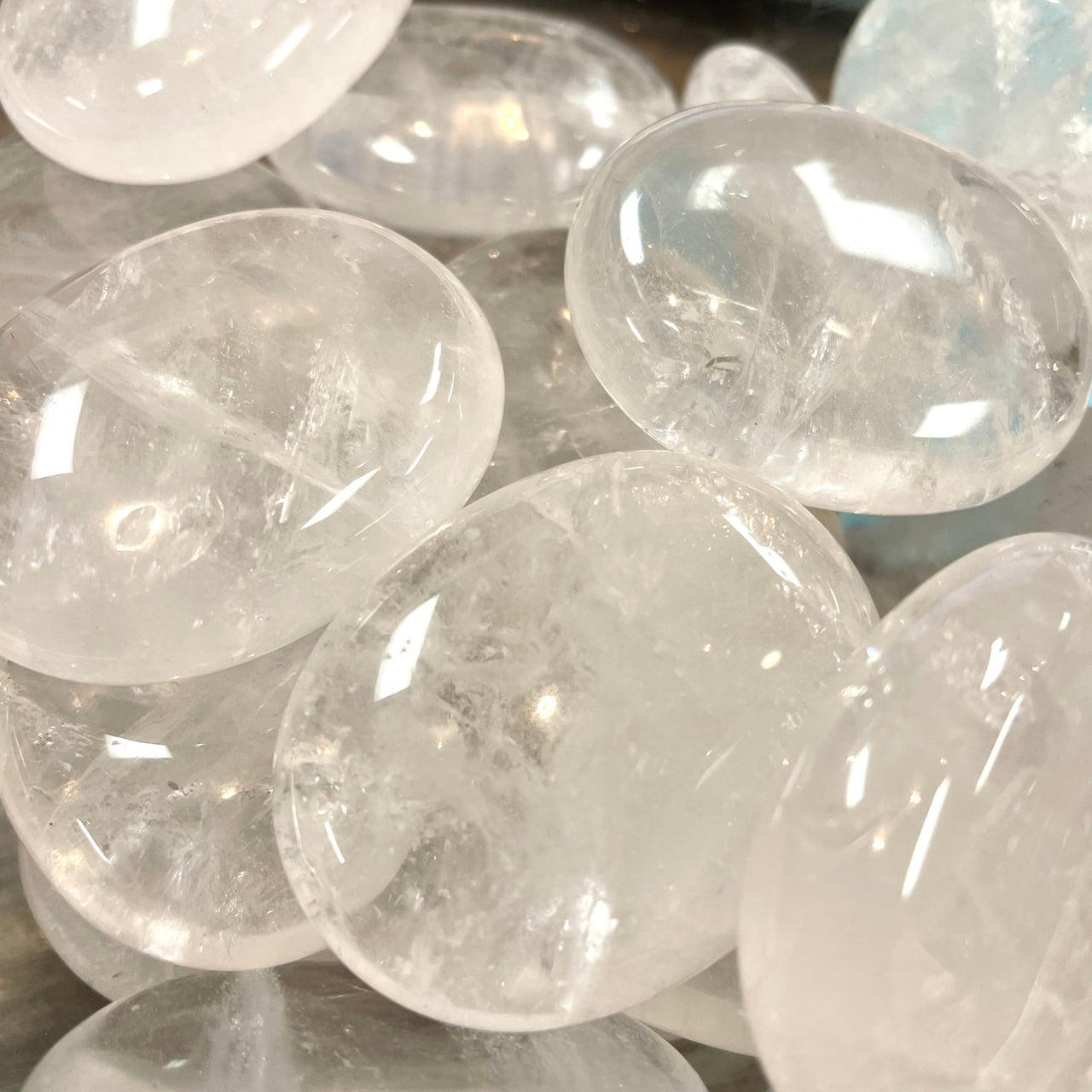 Clear Quartz Palm P036 featuring glassy translucent crystal spheres and tumbled stones