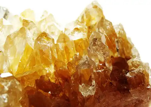 Cluster of honey-colored citrine crystals with translucent, angular formations.
