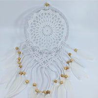 White crocheted dreamcatcher with beads and feathers, perfect for referral history rewards