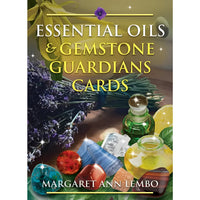 Essential oils and gemstone guardian cards by Margaret Ann Lembo displayed together