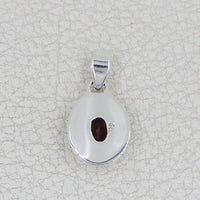 Sterling silver teardrop pendant with faceted oval garnet and circle designs #BC0409