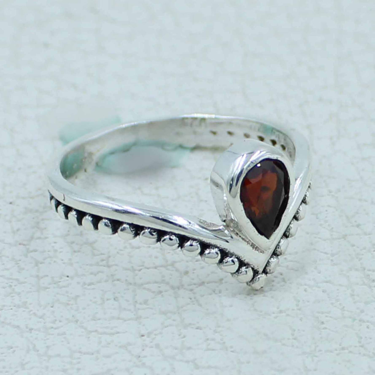 Garnet faceted V-shape sterling silver ring BC0410 with teardrop stone