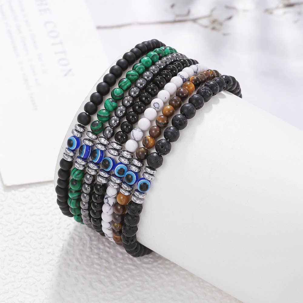 Stack of beaded gemstone evil eye protection bracelets in a choose stone design