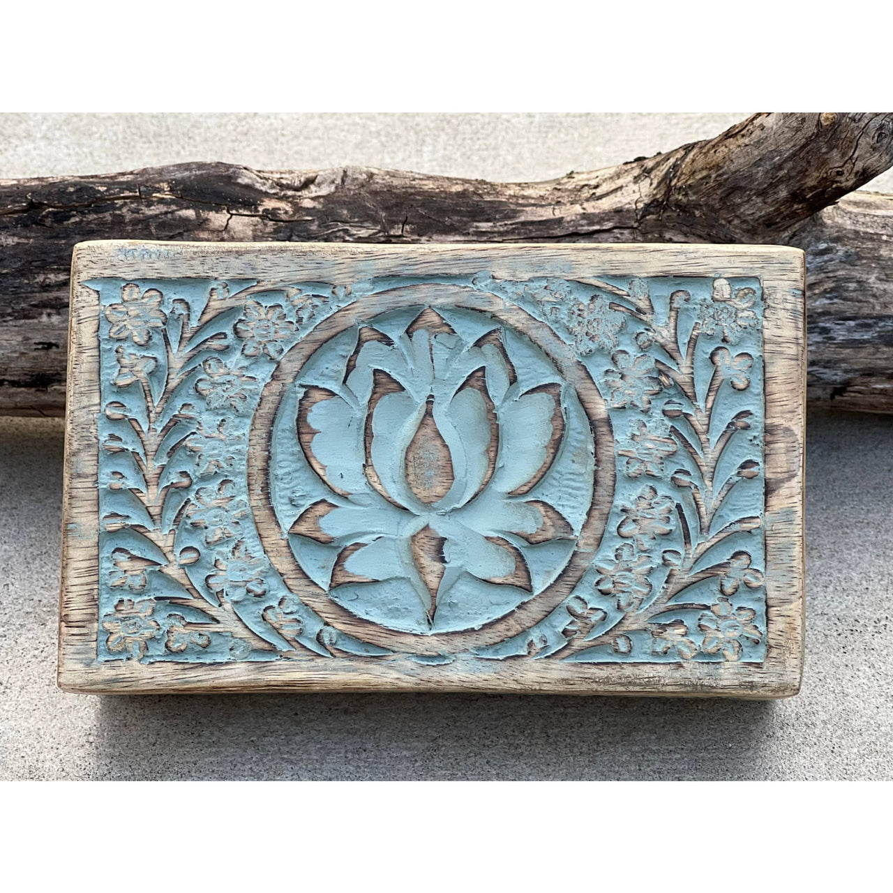 Rectangular carved wooden box with lotus flower design for elegant storage