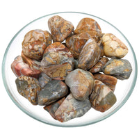 Bowl of Ibis Jasper XL Tumbled Stones showcasing unique textures and colors