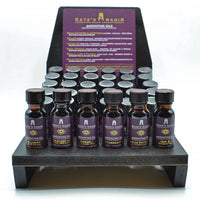 Kate’s Magick Anointing Oil: 6 dark amber bottles with purple labels