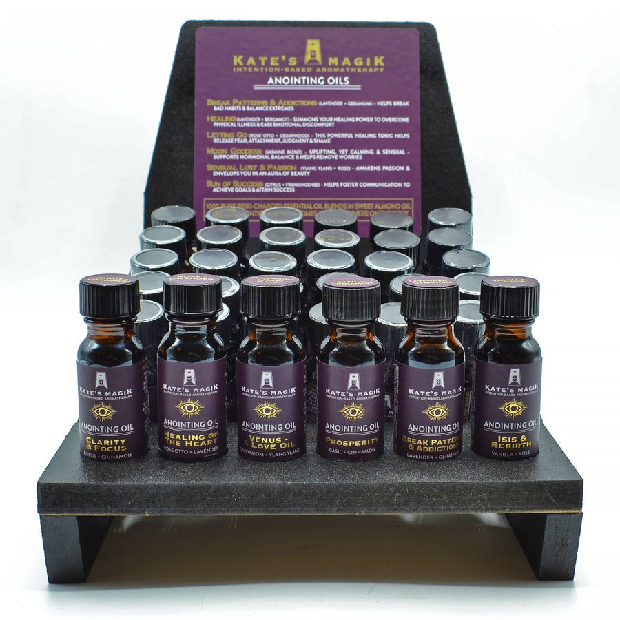 Kate’s Magick Anointing Oil: 6 dark amber bottles with purple labels