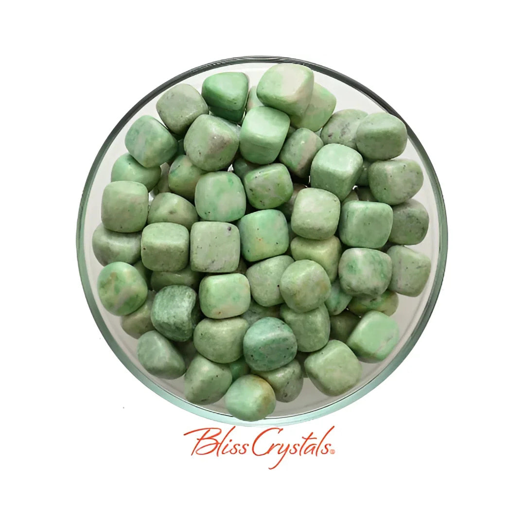 A bowl of green jade pebbles in Mariposite Tumbled Stone aka Green Muscovite #MT12