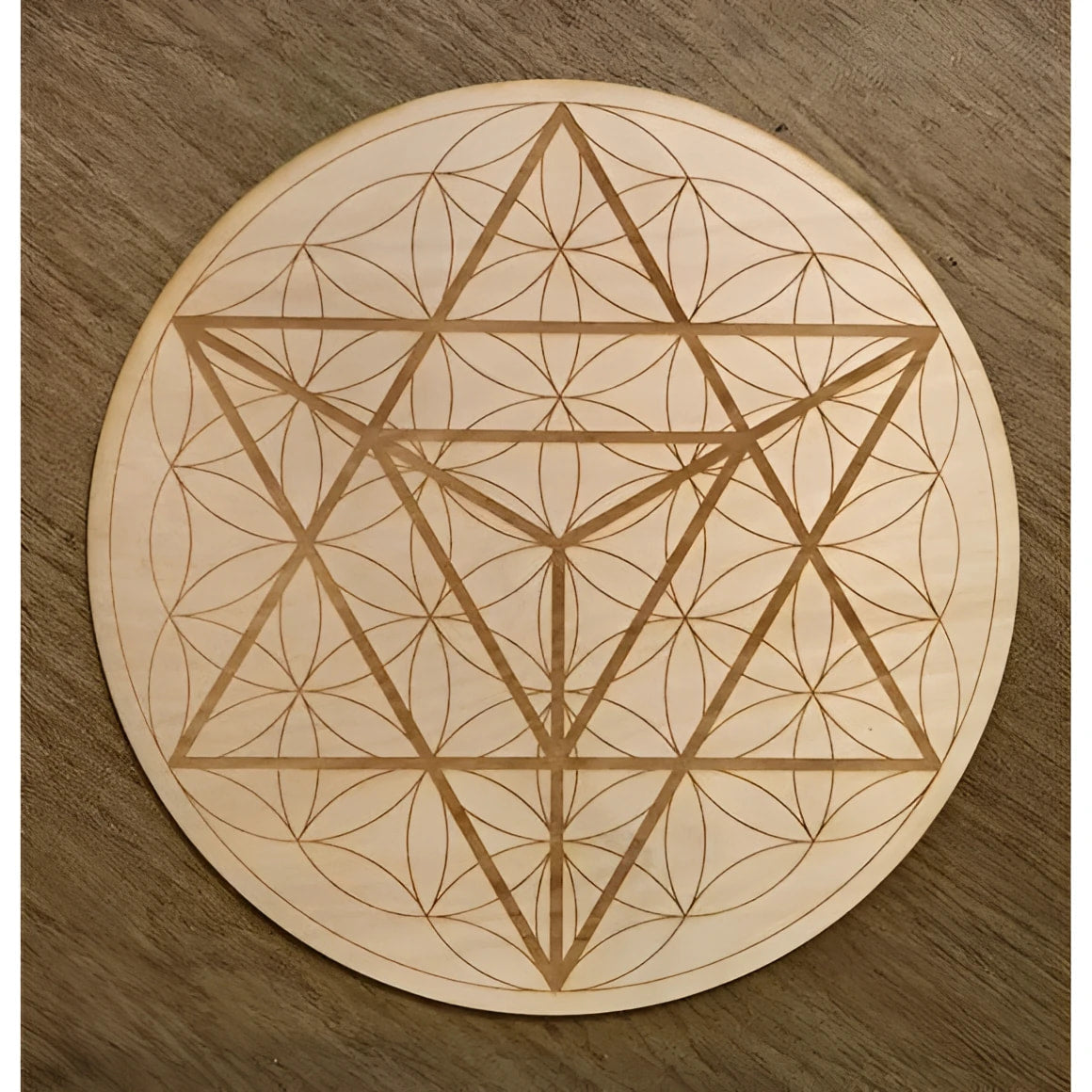 Wooden Merkaba Flower of Life coaster with star design, light brown