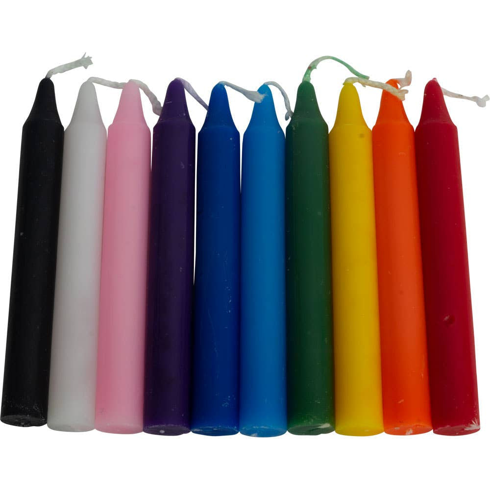 Colorful spell candles arranged in a row from the Mini Ritual Candles Assortment You Choose Color