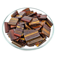 Mugglestone Jasper Grade A Slice SK6304 featuring a pile of Tiger’s Eye gemstones