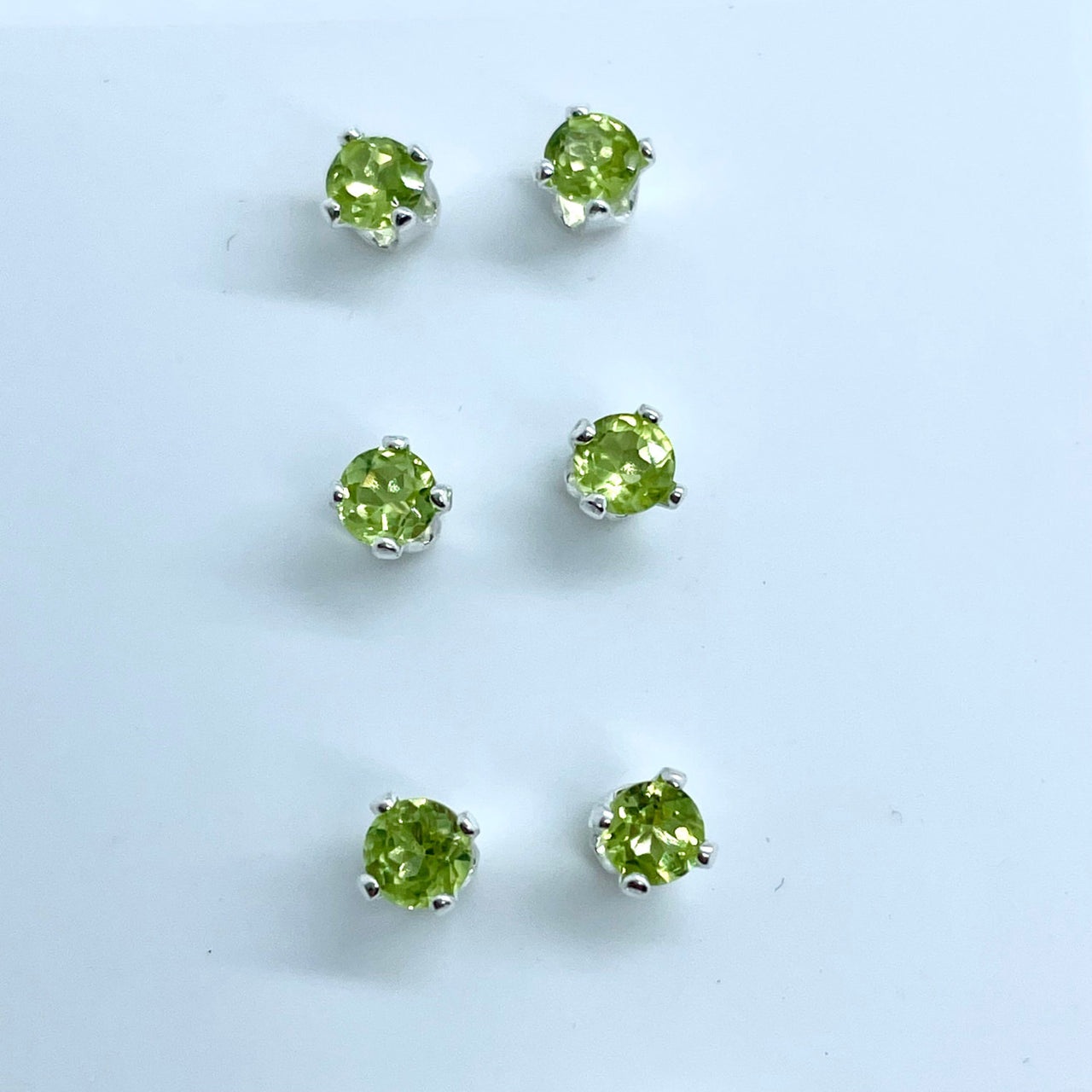 Peridot Faceted Sterling Silver Stud Earrings featuring pernite gems from the pernite mine