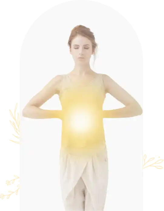Person in white clothing with a glowing yellow light emanating from their torso area.