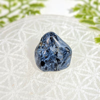 Polished blue sodalite tumbled stone Pietersite 1.2in specimen BC1153