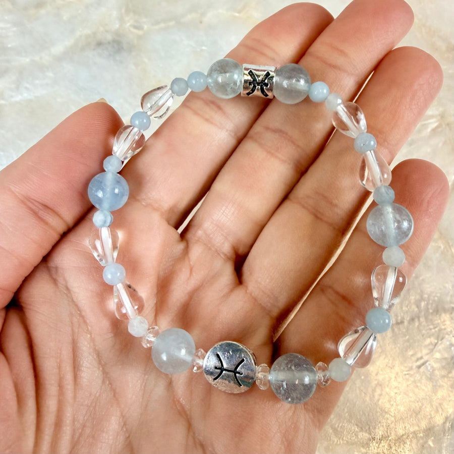 Delicate Pisces zodiac beaded bracelet with light blue quartz, silver charms, 7 inches