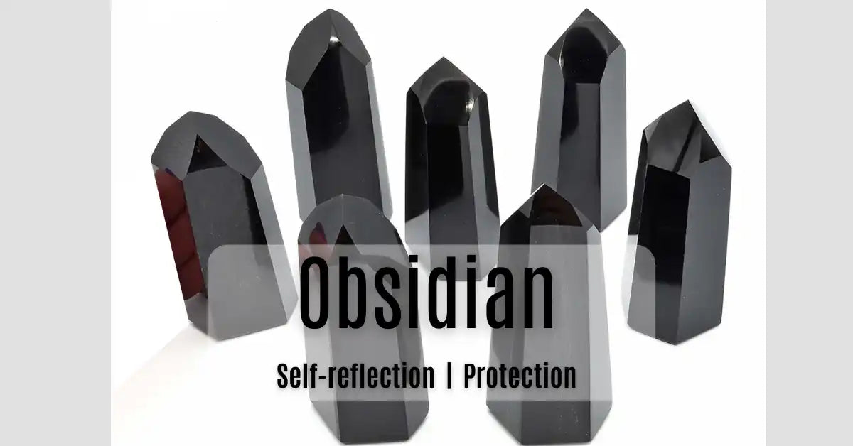 Polished black obsidian towers.