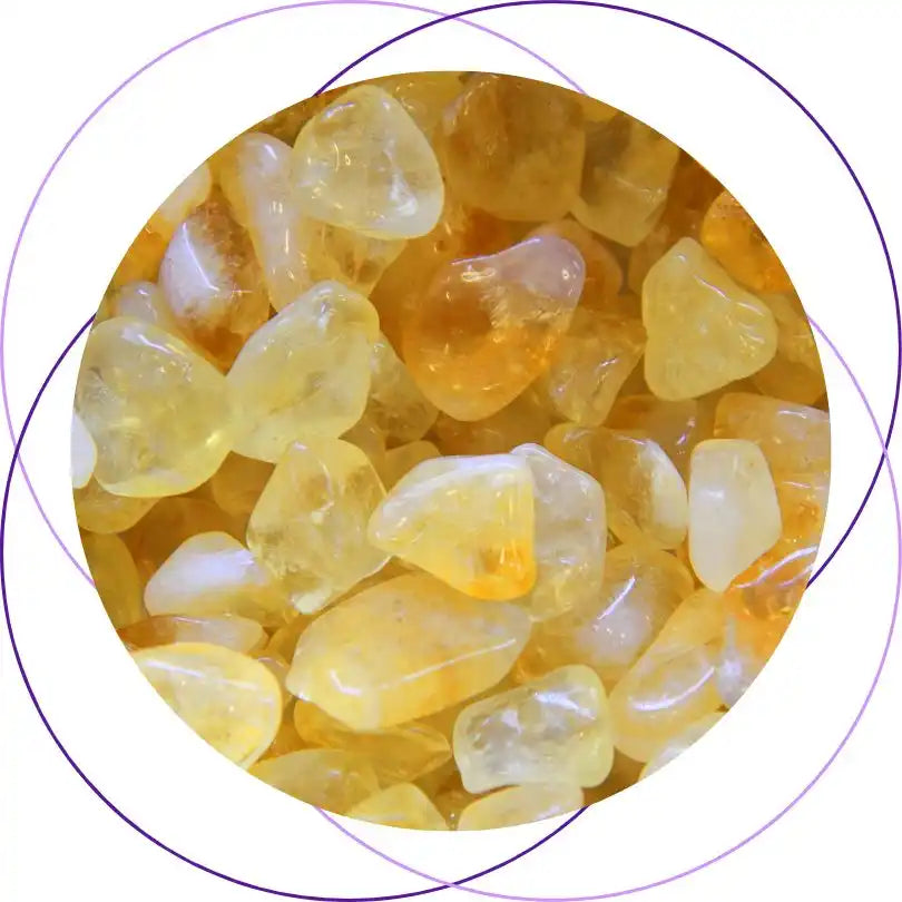 Polished citrine crystals in various tumbled shapes.
