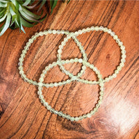 Light green beaded Prehnite 7-inch faceted bracelet displayed in product #LV1844