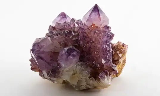 Purple amethyst crystal cluster with angular geometric formations.