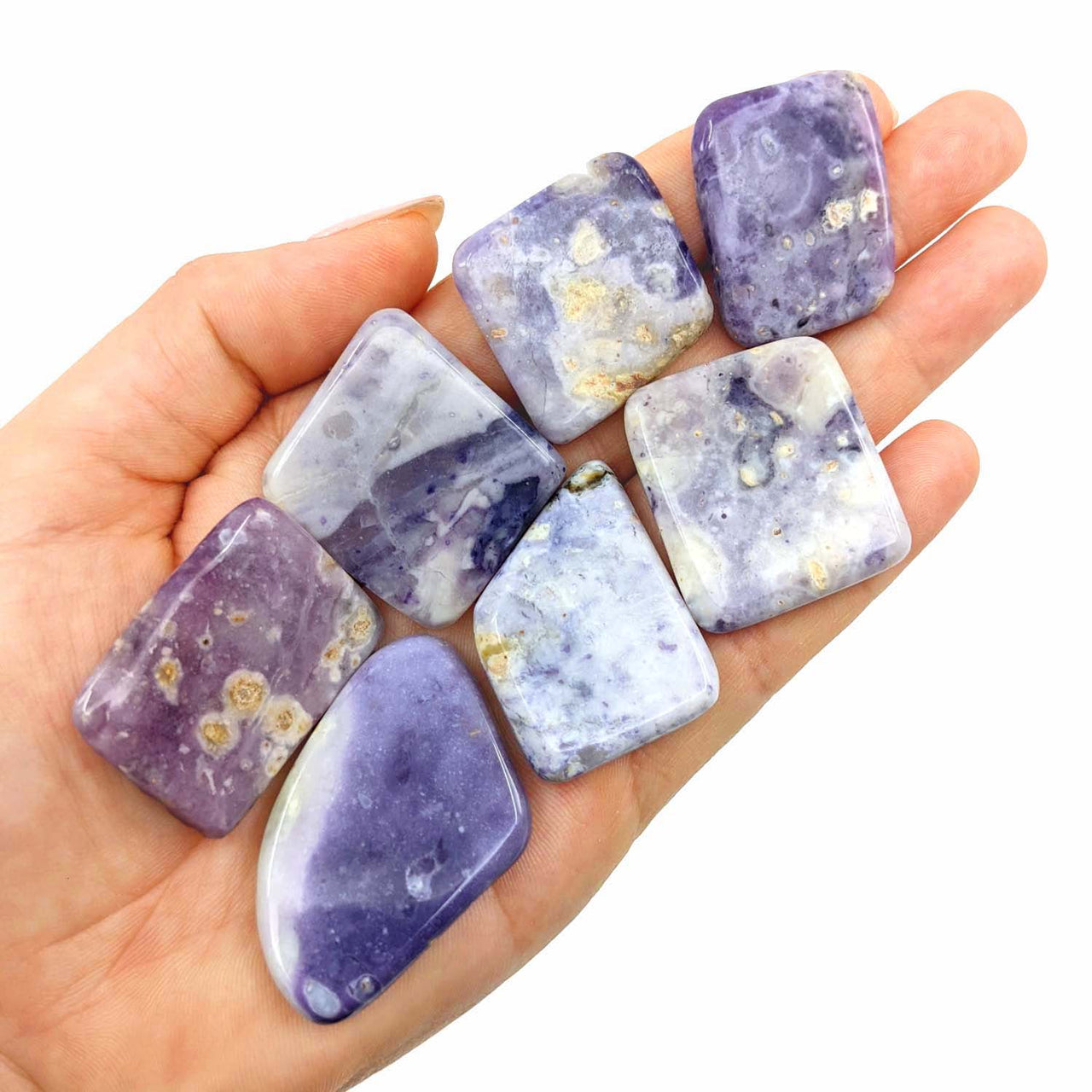 Purple Opal Polished Slice SK8022 with trichroic agate stones in an open palm