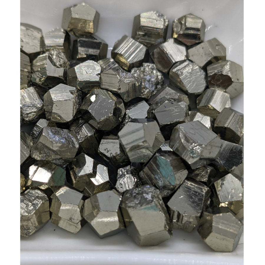 Metallic Pyrite Mini Nugget showcasing unique cubic and dodecahedral crystal shapes