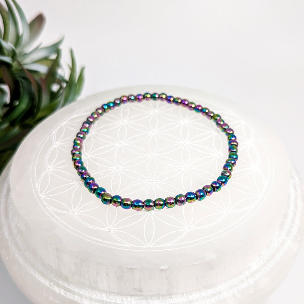Iridescent beaded bracelet in rainbow colors with hematite 4mm beads, 7 inches long